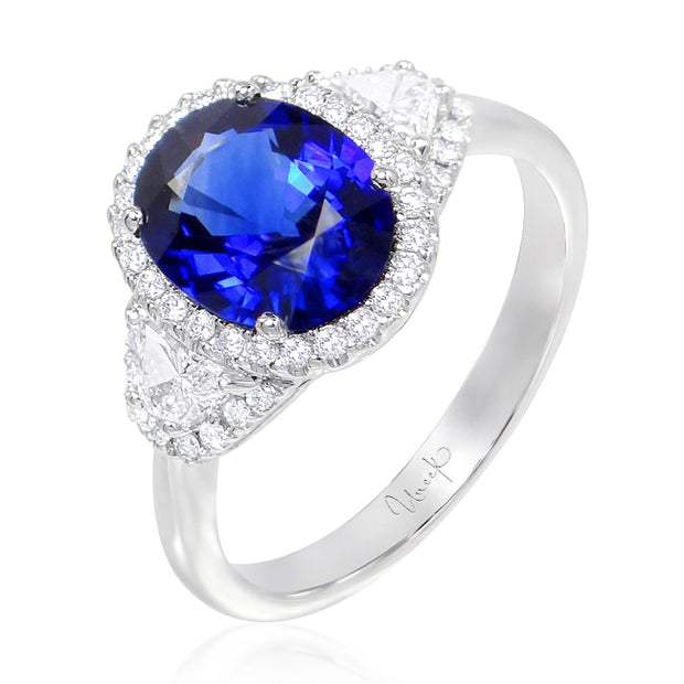 Uneek Three-Stone Oval Blue Sapphire and Trap Cut Diamond Halo Ring