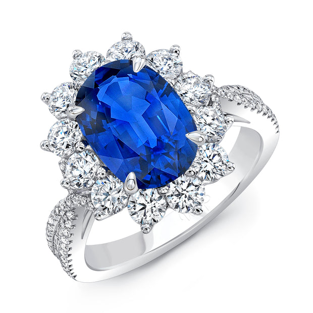 Uneek Oval Blue Sapphire Cocktail Ring with Sunburst Diamond Halo and Tapered Diamond Accents