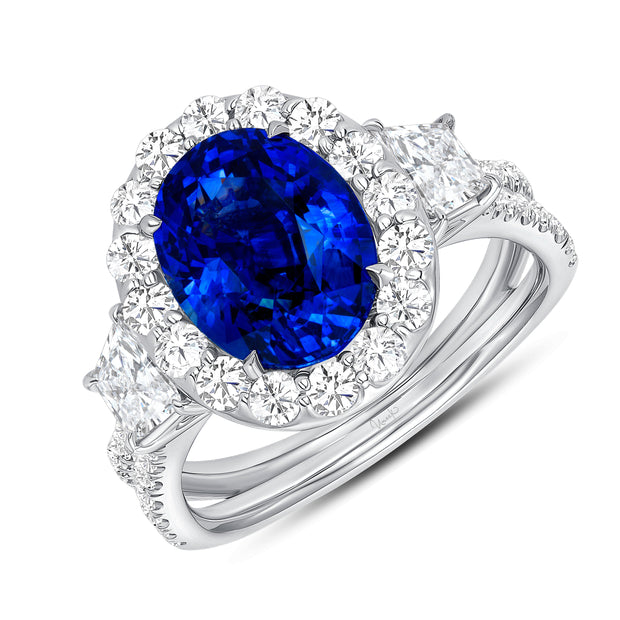 Uneek Oval Blue Sapphire Ring with Round Diamond Halo and Trapezoid Diamond Sidestones