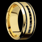 9 mm wide/High Bevel/14K Yellow Gold band with  two 1 mm Wide inlays of Black Onyx and featuring an  arrangement of 9, .03 carat Round Black Diamond stones in a Channel setting