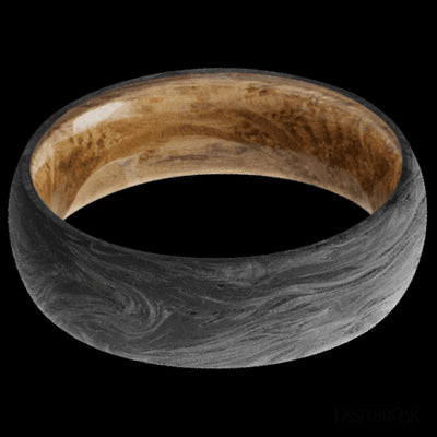 7 mm wide Domed Forged Carbon Fiber band featuring a Whiskey Barrel sleeve.
