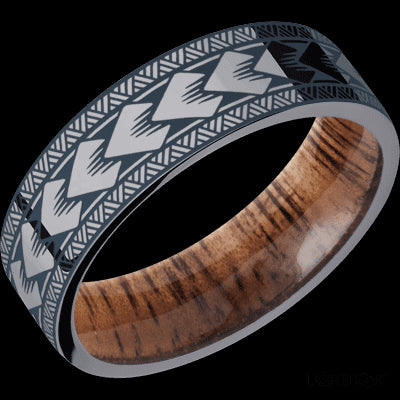 7 mm wide/Flat/Tantalum band with a laser carved Maori pattern also featuring a Koa sleeve.