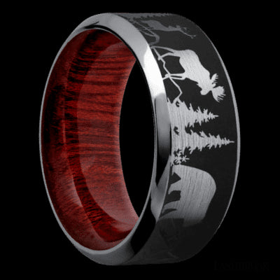 9 mm wide/High Bevel/Tantalum band with a laser carved Bear Moose Deer Mountain pattern also featuring a Blood Wood sleeve.