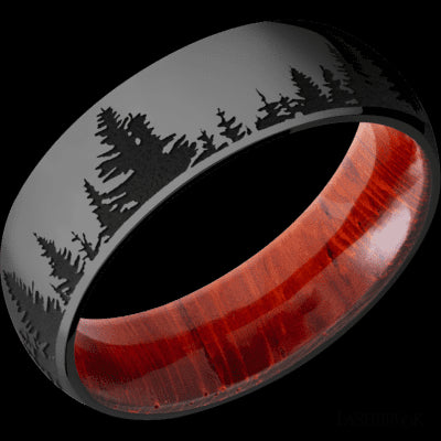 7 mm wide/Domed/Zirconium band with a laser carved Trees pattern also featuring a Padauk sleeve.