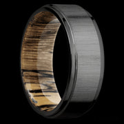 8 mm wide Flat Grooved Edges Zirconium band featuring a Spalted Tamarind sleeve.