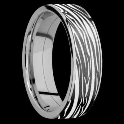 7 mm wide/Flat/Titanium band with one 6 mm Centered inlay of Zirconium with a laser carved Zebra pattern.
