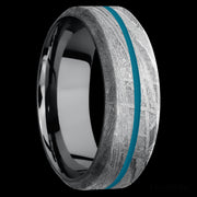8 mm wide/High Bevel/Meteorite band with one 1 mm Centered inlay of Sea Blue also featuring a Tantalum sleeve.