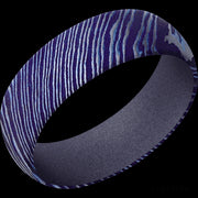 7 mm wide Domed Titanium Damascus band featuring a Crushed Orchid sleeve.
