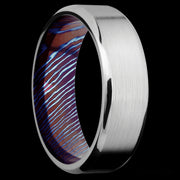 7 mm wide Beveled Cobalt Chrome band featuring a Titanium Damascus sleeve.