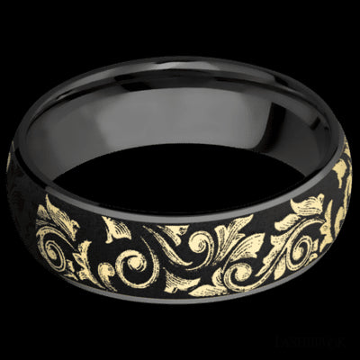 7 mm wide/Domed/Zirconium band with one 6 mm Centered inlay of 14K Yellow Gold with a laser carved Western Scroll pattern.