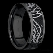 8 mm wide/Flat/Zirconium band with one 6 mm Centered inlay of Tantalum with a laser carved Branches pattern.