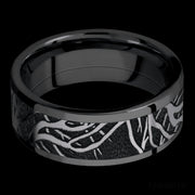 8 mm wide/Flat/Zirconium band with one 6 mm Centered inlay of Tantalum with a laser carved Branches pattern.