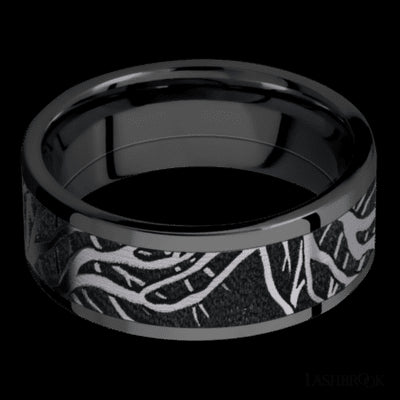 8 mm wide/Flat/Zirconium band with one 6 mm Centered inlay of Tantalum with a laser carved Branches pattern.